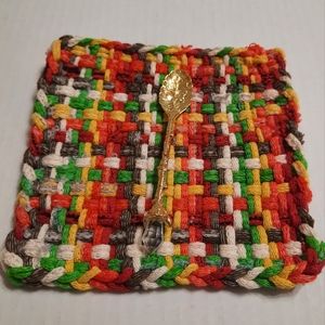 Mug rug and teaspoon